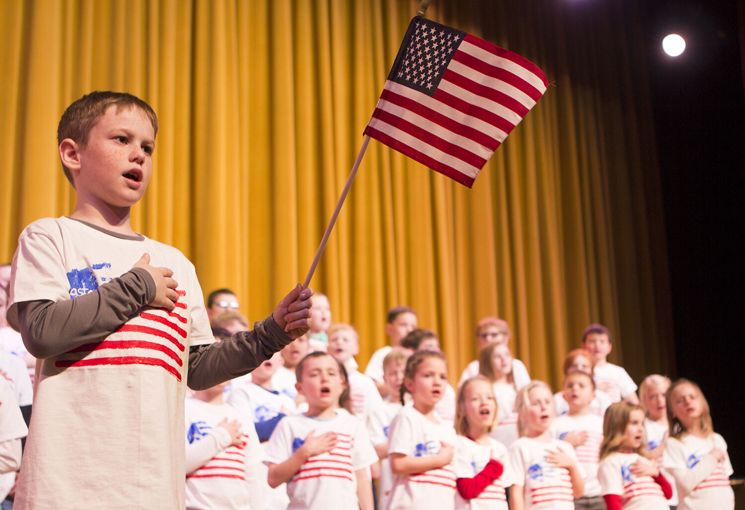 Easton Hill leads Meadowlark Elementary first graders in a rendition